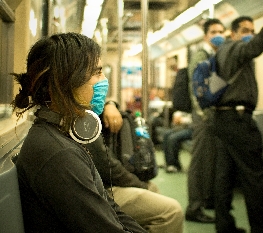Swine Flu Masked Train Passengers